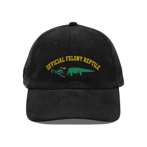 Lacoste-style alligator in a ski mask biting a crowbar under bold arched lettering, on a hat — Black
