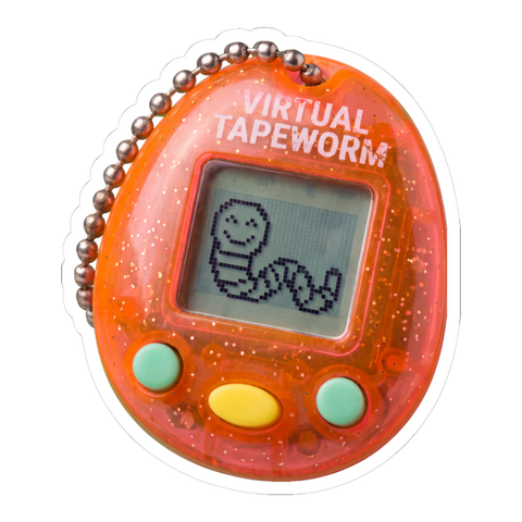 Tamagotchi-style keychain toy whose pixel pet is a smiling tapeworm, on a sticker — White