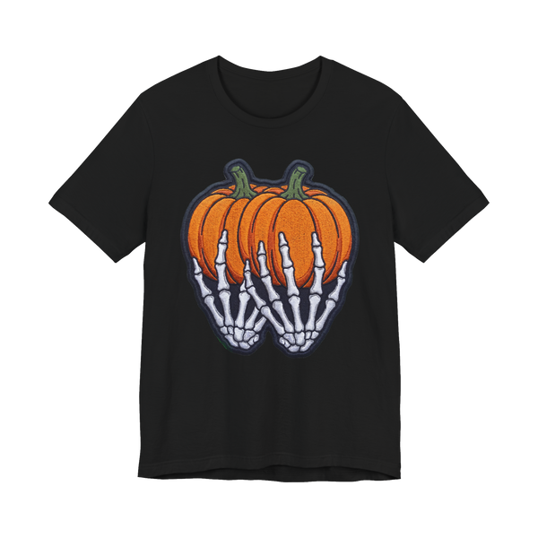 A funny Halloween shirt featuring a graphic of a skeleton groping two pumpkins.