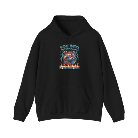 Raccoon in rainbow shades over flames with the pronoun joke LET ME SHE/THEM TITTIES, on a hoodie — Black