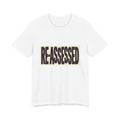 RE-ASSESSED Stamp T-Shirt — Funny Dystopian Bureaucracy Tee — view 1