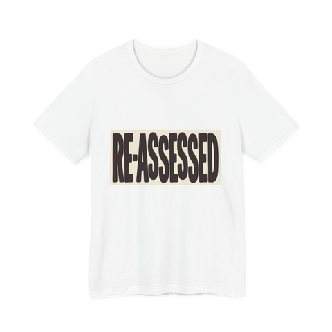 RE-ASSESSED Stamp T-Shirt — Funny Dystopian Bureaucracy Tee