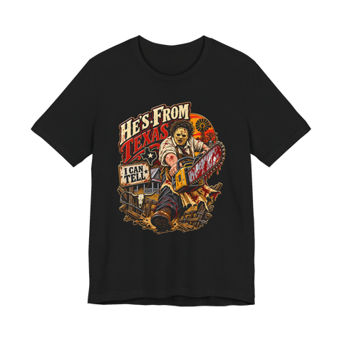 Leatherface revving a bloody chainsaw under He's From Texas, I Can Tell, on a t-shirt