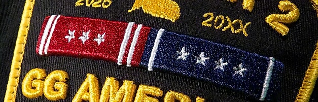 Macro: the dual-campaign ribbon, red field with three stars, blue field with four