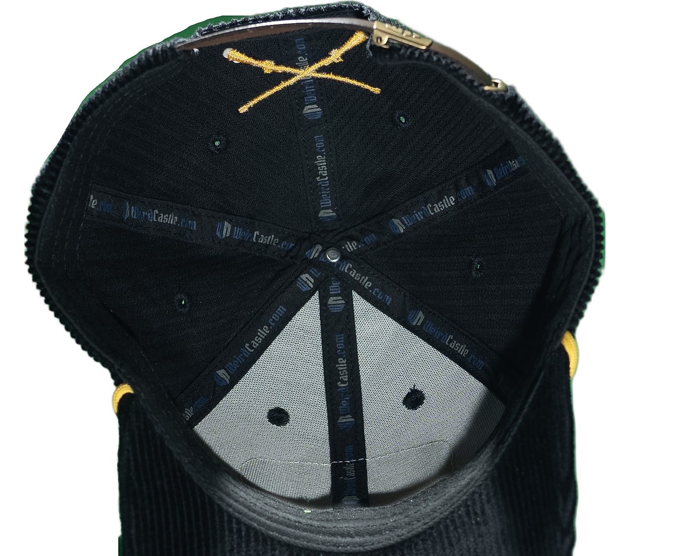 Interior of the cap: crossed sabers embroidered under the crown, every seam bound in woven WeirdCastle.com taping